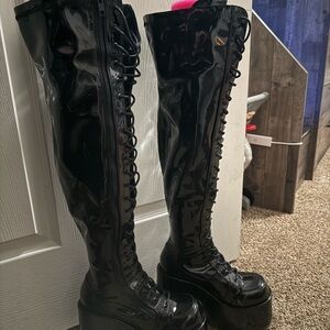 Demonia Camel-300 Black Patent Platform Boots